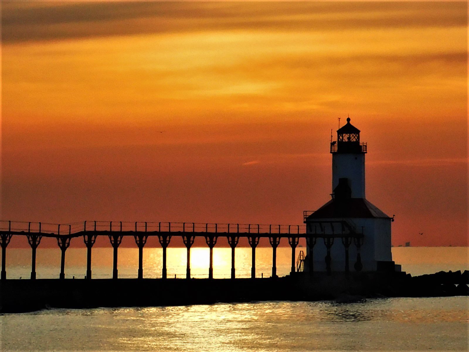 Michigan City Breakwater Lighthouse at sunset